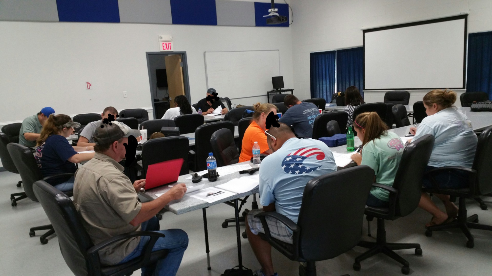 Students completing the classroom portion of concealed carry training